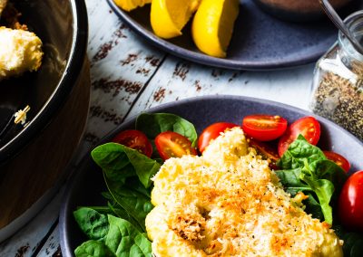 Cococonut-cauliflower-steaks-lemon-tomatoes-spinach